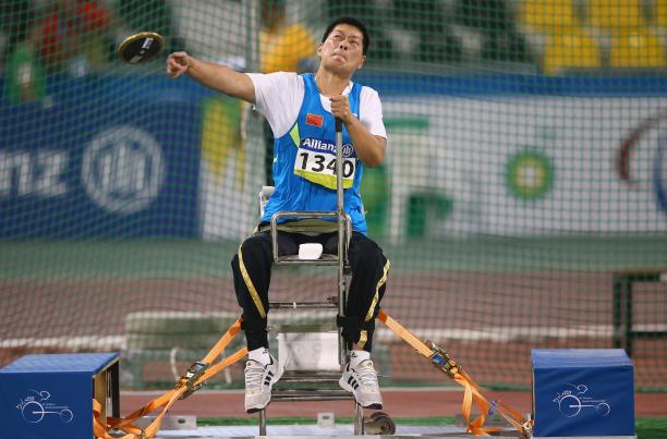 Chian's Liwan Yang competes in the women's discus F55 final during the 2015 IPC Athletics World Championships in Doha, Qatar.