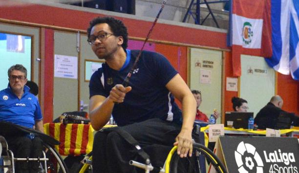 a male Para badminton player in action