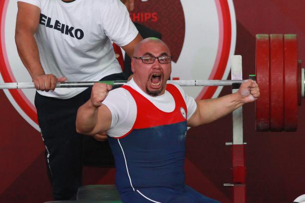 Juan Carlos Garrido - Berck-sur-Mer 2018 a male powerlifter raises his fists in celebration on the bench