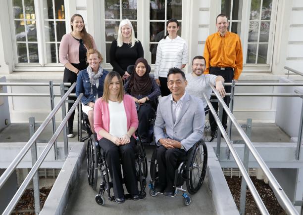 Athletes Council in Bonn - June 2018 a group of male and female Para athletes sitting and standing outside a white building