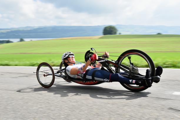 Karen Darke female British Para cyclist Karen Darke racing with a hand-bike on a road