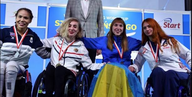 Anastasia Kastsiuchkova - 2018 Warsaw World Cup four female wheelchair fencers on the podium with Anastasia Kastsiuchkova on the right