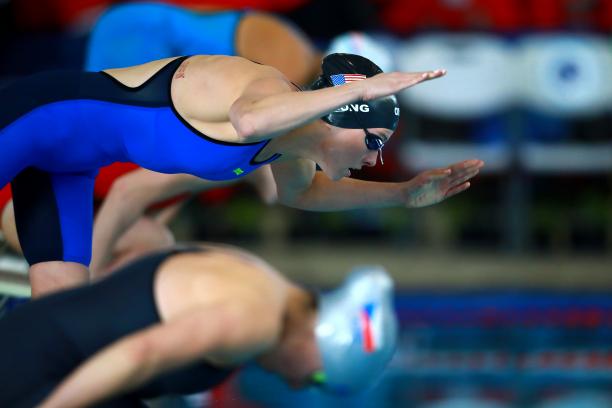 female Para swimmer Jessica Long dives into the swimming pool