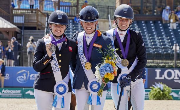 Rixt van der Horst - Tryon 2018 three female Para equestrian riders with Rixt van der Horst in the centre, standing on the podium