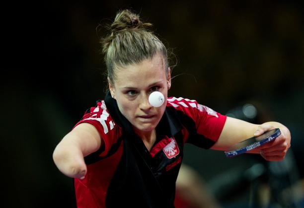 Natalia Partyka Natalia Partyka competing at the Para Table Tennis World Championships, holding the bat and watching the ball closely