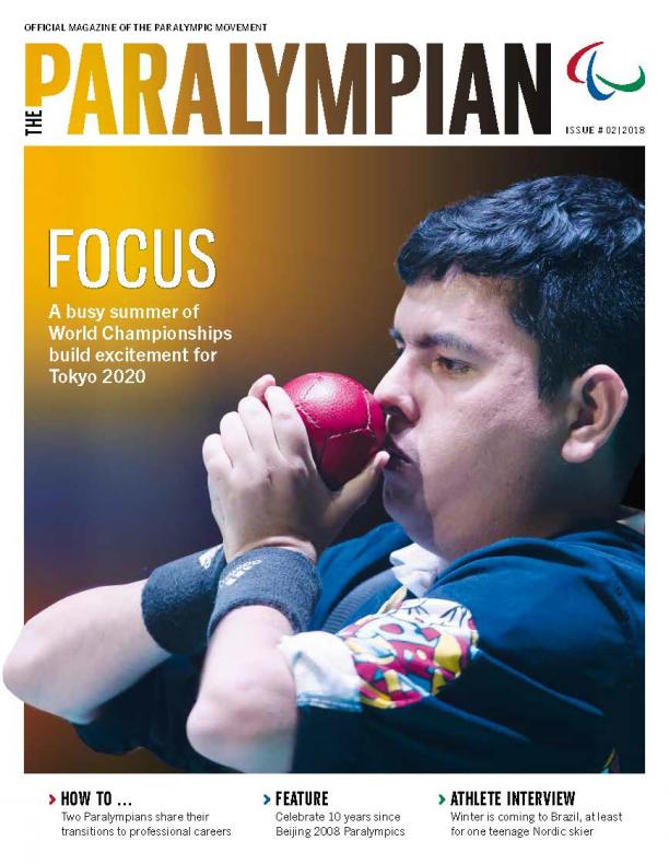 The Paralympian Issue No. 2 2018 - cover Magazine cover photo of Colombian athlete drawing a boccia ball to his face