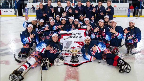 USA Para ice hockey team A group of Para ice hockey players celebrating on ice