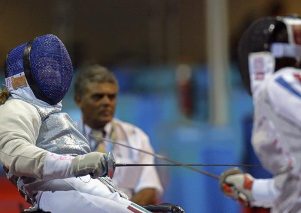 Zsuzsanna Krajnyak female wheelchair fencer Zsuzsanna Krajnyak dodges away from the foil
