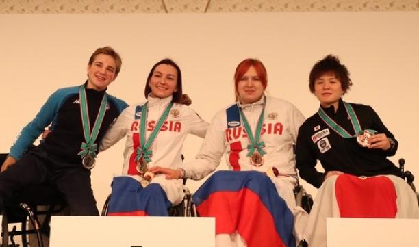 Ludmila Vasileva and Beatrice Vio - Kyoto World Cup female wheelchair fencers Ludmila Vasileva and Beatrice Vio hugging on the podium