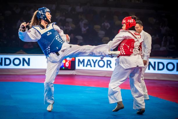 Amy Truesdale - 2017 World Para Taekwondo Champs two female Para taekwondo fighters kick at each other