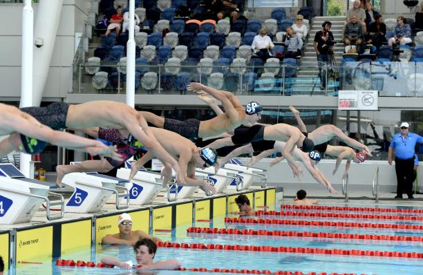 Melbourne World Series 2019 - day one male Para swimmers diving into a pool at the start of the race in Melbourne