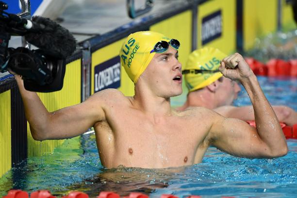 Timothy Hodge male Para swimmer Timothy Hodge fistpumps after winning a race
