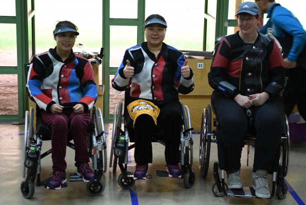 Zhang Cuiping - Al Ain 2019 three female Para shooters with Zhang Cuiping giving a thumbs up