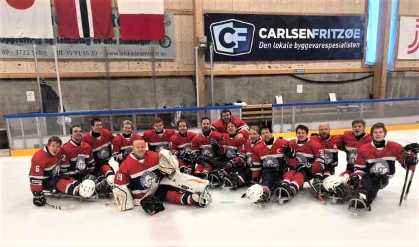 Norwegian National Para Ice Hockey Team - Skien NIHF Invitational Tournament 2019 Norwya's Para ice hockey team posing for picture on the ice rink