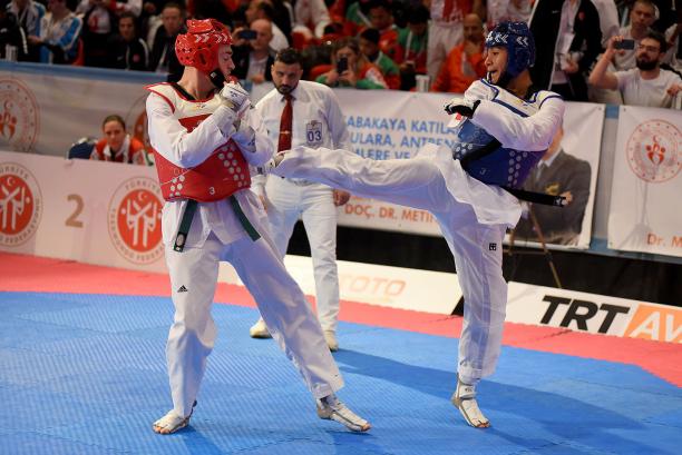 Juan Diego Garcia Lopez male Para taekwondo fighter Juan Diego Garcia Lopez kicks another fighter in the chest