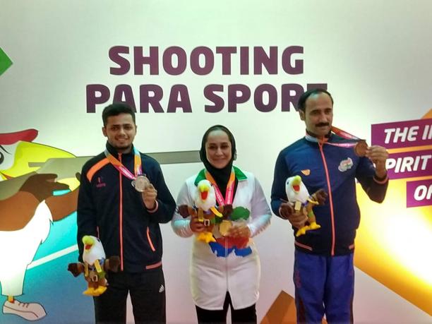 Manish Narwal - India Narwal, on the left, at the Indonesia 2018 Asian Para Games