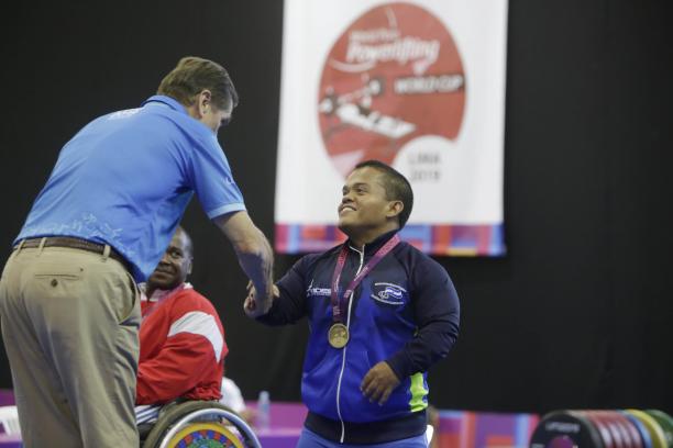 Herbert Aceituno - Liima World Cup male Para powerlifter Herbert Aceituno shaking hands with an official