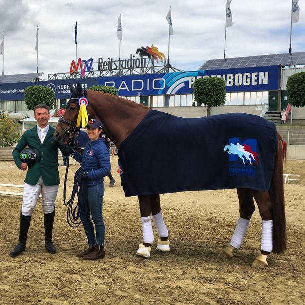 Rodolpho Riskalla - equestrian - Brazil Brazilian Para dressage rider posing with his horse and a staff member for a photo