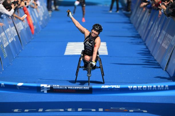 Wakako Tsuchida - triathlon - Japan Japanese female Para triathlete Wakako Tsuchida punches the air as she crosses the finish line