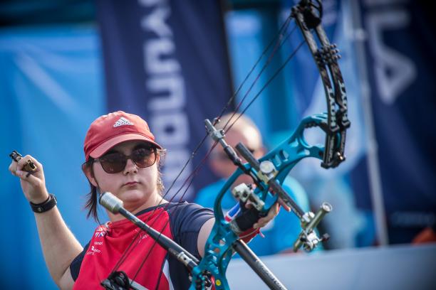 Jessica Stretton - Great Britain - archery Jessica Stretton wearing glasses and a cap while competing