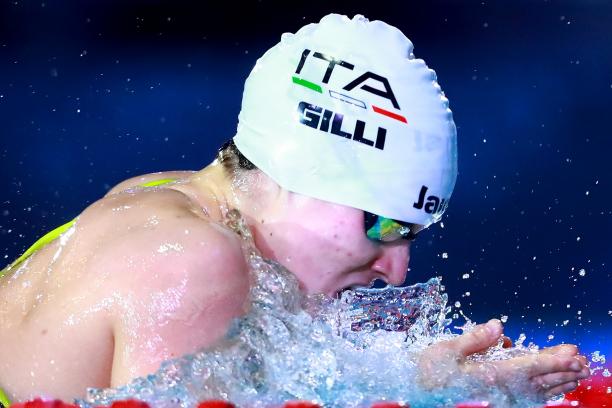 Profile of Carlotta Gilli while swimming during a competition