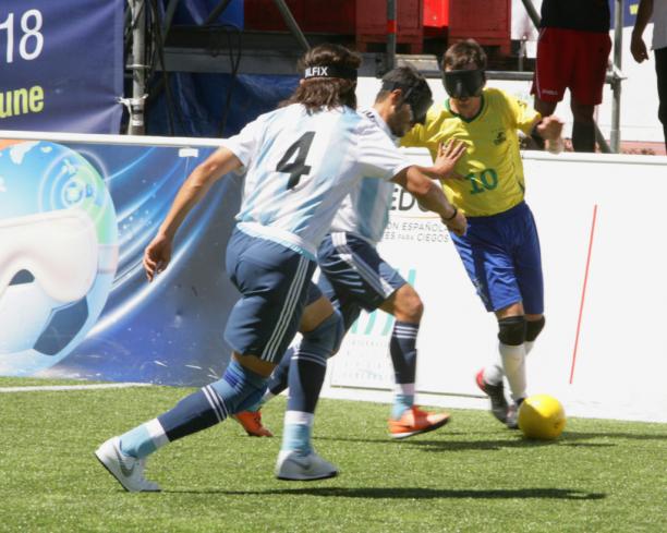 Ricardinho - Brazil Ricardinho takes the ball while facing two Argentinian defenders