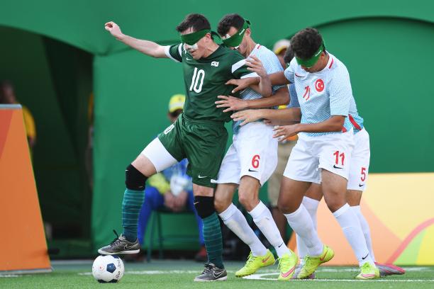 Ricardinho - Brazil Ricardinho controls the ball, while two Turkish players try to take it from him