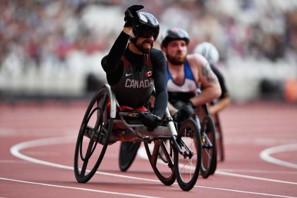 Brent Lakatos of Canada crosses the line to win in the Mens 100m T53 final at the London 2017 Para Athletics Championships.
