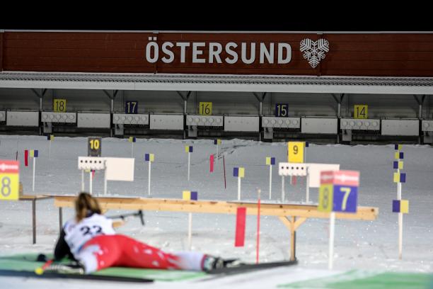 Ostersund 2019 Para Nordic Skiing World Cup A female Para biathlete laying on the ground to shoot on the target