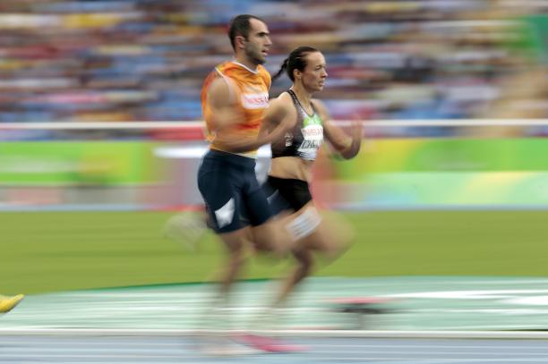 Elena Chebanu - Azerbaijan - Para Athletics - Rio 2016 A female sprinter next to her guide on an athletics track