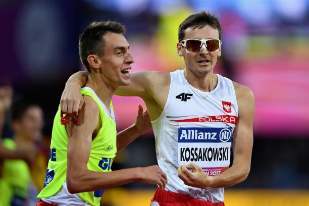 Aleksander Kossakowski of Poland and guide Sylwester Lepiarz - London 2017 World Para Athletics Championships A male athlete celebrating with his guide