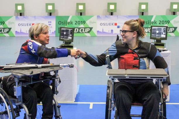 Veronika Vadovicova Veronika Vadovicova fist bumps athlete after winning gold.