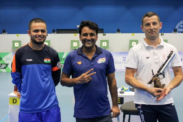 Jakhar Rahul and Manish Narwal - India - Osijek 2019 World Cup Three male pistol shooters pose for a photo
