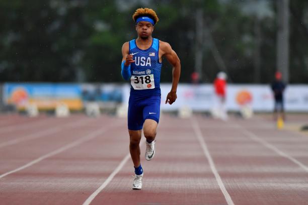 Noah Malone - USA - Nottwil 2019 World Para Athletics Junior Championships African American male teenager runs on the track