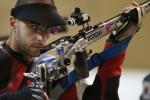 Matthew Skelhon of Great Britain catches a glimpse of the camera while competing in the mixed R6-50m Rifle Prone- SH1 final
