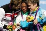 L-R) Silver medallist Cigdem Dede of Turkey, gold medallist Ivory Nwokorie of Nigeria and bronze medallist Lidiia Soloviova of Ukraine console each other on the podium during the medal ceremony for the women's