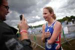 Para-triathlete Clare Cunningham of Great Britain talks to a journalist