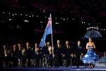 An athlete carries Australia's flag through the stadium at the London 2012 Opening Ceremony.