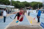 Markus Rehm, single leg amputee extends his legs over the long jump pit