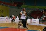 Wheelchair basketball player doing s free shot