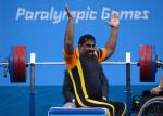 Mariappan Perumal of Malaysia waves to the crowd before he competes.