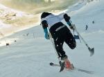 A picture of a woman skiing