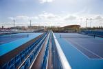A picture of blue tennis courts