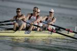 A picture of 4 people rowing