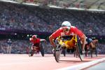A picture of a man in a wheelchair on a track