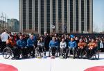 Participants at the first National Paralympic Day in South Korea get ready to try wheelchair curling.