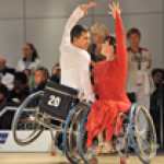 Athletes practicing wheelchair dance sport.