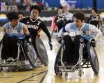 wheelchair rugby players on the field