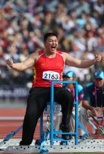 China's Guoshan Wu celebrates a throw as he competes in the men's shot put F57/58 final at the London 2012 Paralympic Games