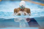 Swimmer in the water, doing breaststroke